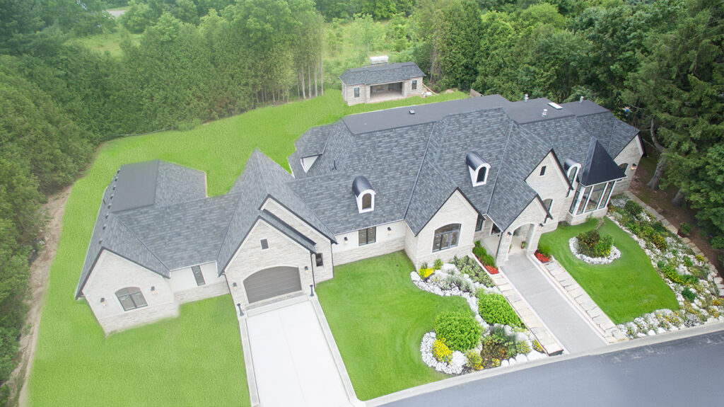 Roof replacement by Gateway Roofing on Progreston Rd in Carlisle with GAF Camelot II Designer shingles. Colour: Charcoal